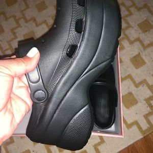 Pair of wedge crocs size 10